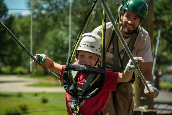 Activity to Open Air Adventure Park. - The course elements: ziplines, rope bridges, swinging logs, and moving platforms