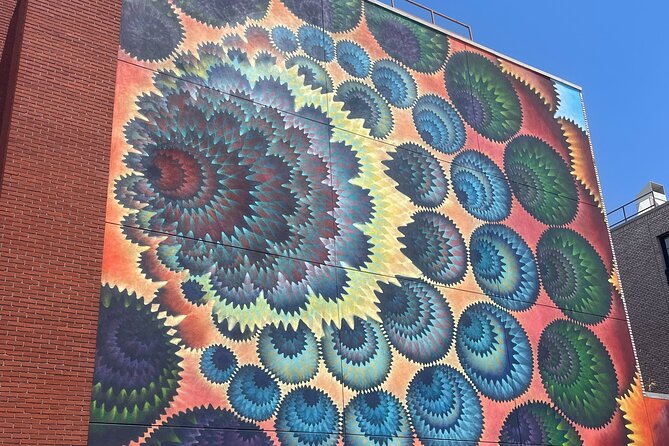 Denver's Art District Self Guided Walking Tour - Stop 1: 2715 Larimer St and the Larimer Boy and Girl mural