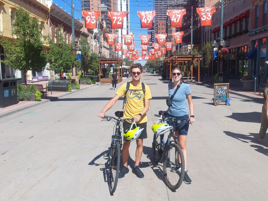 Denver's Highlights: A Guided Bike or Ebike Adventure - Over the Millennium Bridge to REI’s 1901 Tramway Building