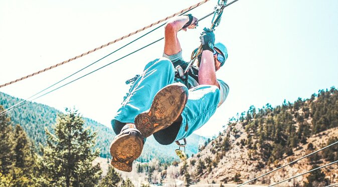 Upper Clear Creek Whitewater Rafting plus Cliffside Zipline from Idaho Springs - First Stop: Idaho Springs Zipline Over Clear Creek Valley